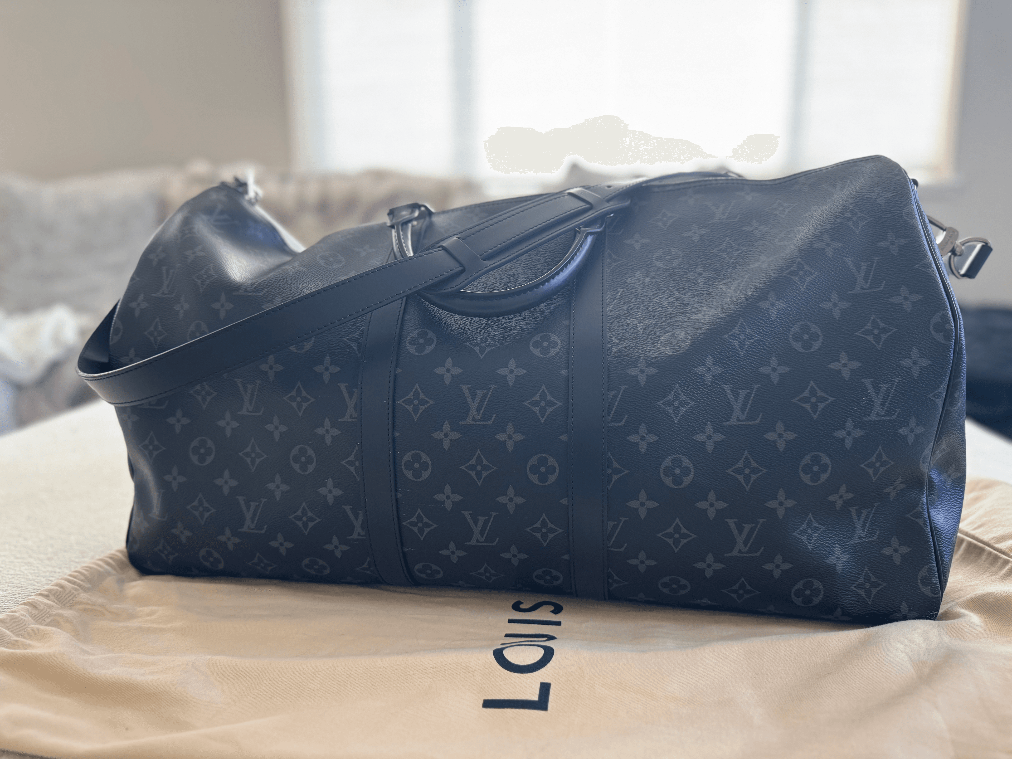 Louis Vuitton — Keepall Bandoulière 50 — photo 1 of 12